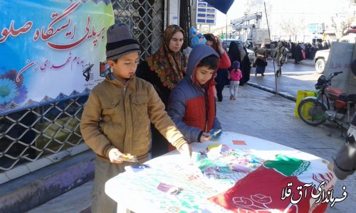 برپایی ایستگاه صلواتی به نام شهدای زن درمسیر راهپیمایی 22 بهمن ماه شهر آق قلا